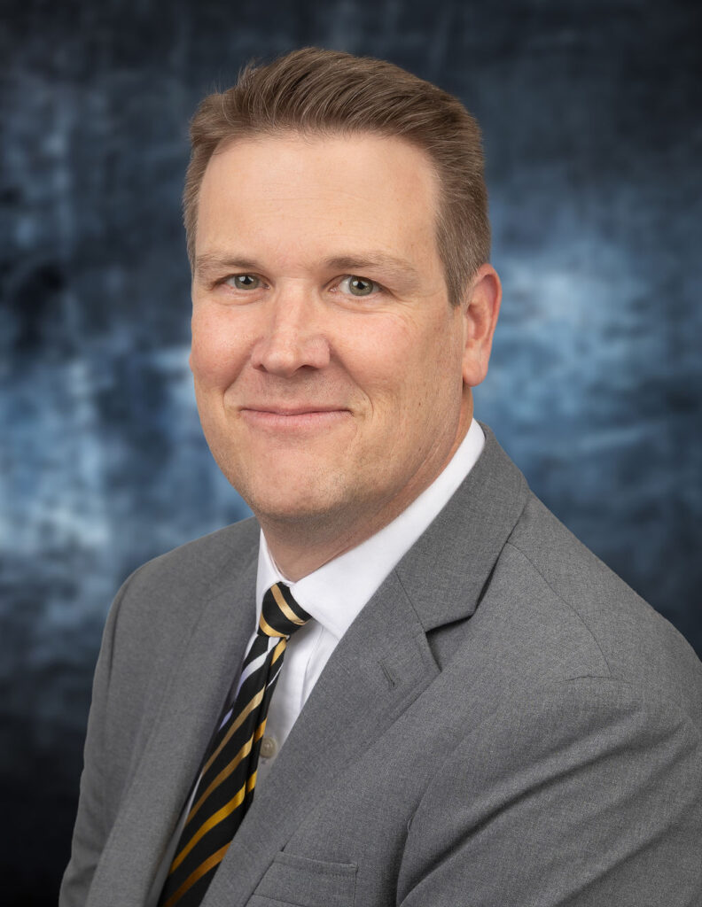 Portrait Headshot of Craig Erwin